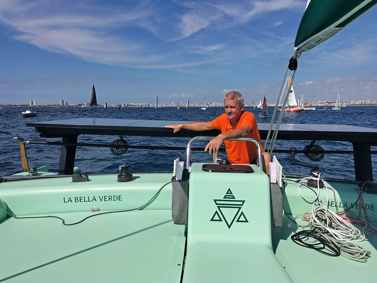 Norbert watching departure of Golden Globe Race, while sailing on board of IY LBV35 "La Bella Verde"