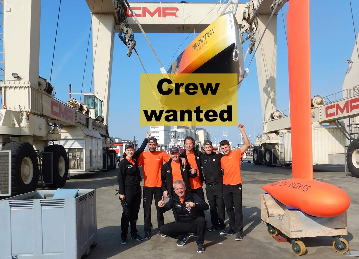 Crew wanted - crew in front of Open60AAL Innovation Yachts, hanging on crane