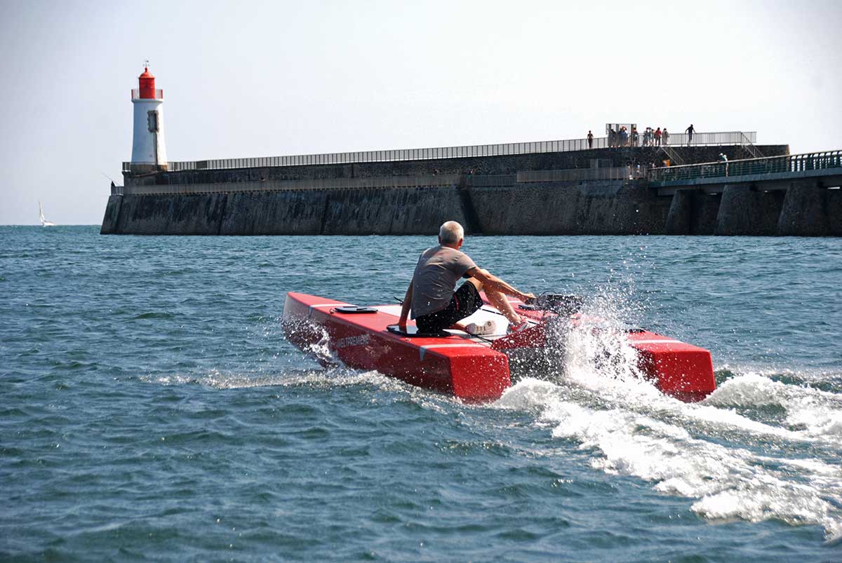 Volcat16 e-motor boat version in front of lighthouse